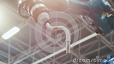 Automated robotic machine for industrial welding, toned Stock Photo