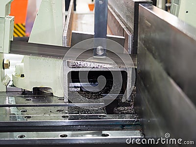 Automatic band saw cutting tool steel bar by automatic feed Stock Photo