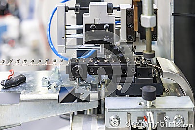 Automatic and continuously electric terminal crimping machine for wiring electrical and electronic industrial Stock Photo