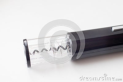 Automatic corkscrew for opening bottle caps. Electric Wine Bottle Opener Stock Photo