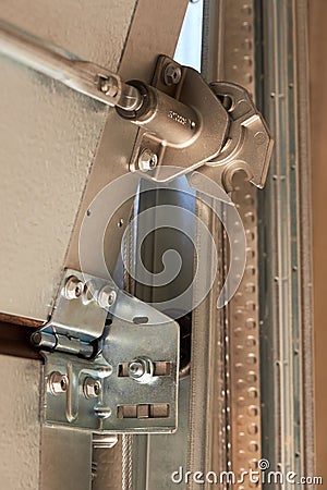 Automatic Garage Door mechanism close up. Lifting gates of the garage. Stock Photo