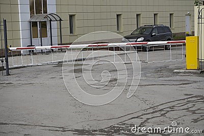 Automatic Gate Barrier Parking sign Building Entrance access security system Stock Photo