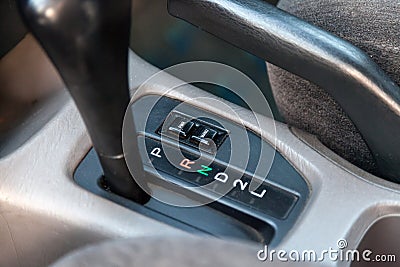 Automatic gearbox in the car on a gray background for movement and acceleration. Abstract image of fast speed. Warranty and recall Editorial Stock Photo