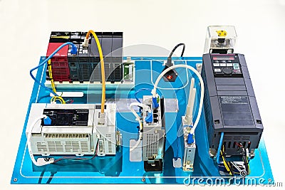 Automatic inverter electric current vector-vfd connect with program logic controller plc & switching hub wireless modem for Stock Photo