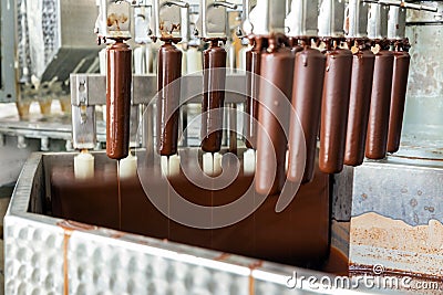 Automatic line for production of ice cream popsicle Stock Photo