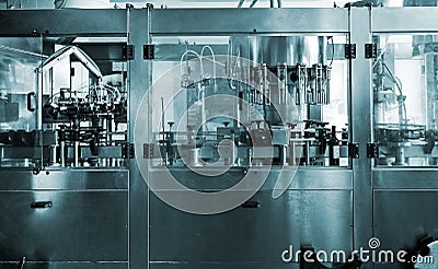 Automatic monoblock wine filling machine Stock Photo