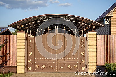 Automatic opening gates and a canopy Stock Photo
