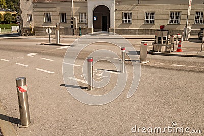 Automatic retractable bollards in the old town of Salzburg, Austria Editorial Stock Photo