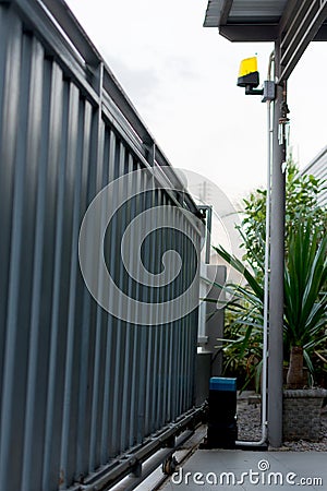 Automatic slide house metal gates Stock Photo