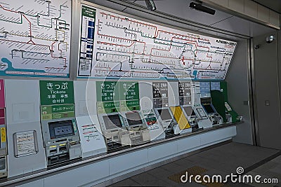 Automatic ticket machines and map of train lines at Japan Rail JR Sendagaya Station Editorial Stock Photo