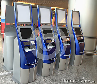 Automatic ticketing system in airport terminal Stock Photo