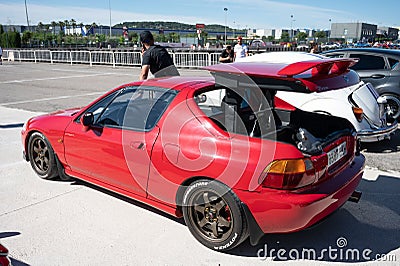 Automatic trunk opening of a red Honda CR-X Del Sol at an exhibit Editorial Stock Photo