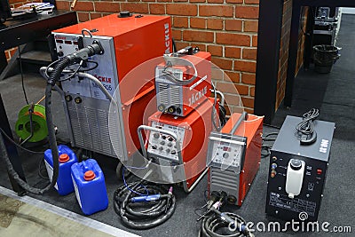 Automatic welding machines welders placed on stand Editorial Stock Photo