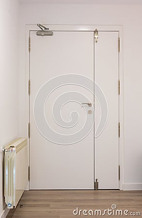 Automatic white door closed from the inside Stock Photo