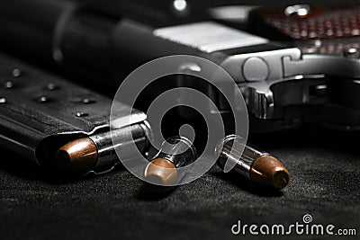 Automatic white gun stainless steel pistol weapon model m1911 with real bullet ammo in magazine with black background Stock Photo