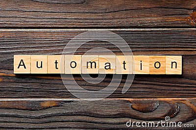Automation word written on wood block. Automation text on wooden table for your desing, concept Stock Photo