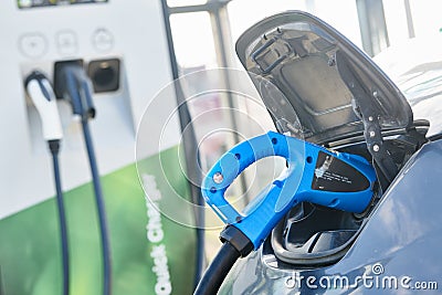 Electric car charging. Ecological automobile Stock Photo