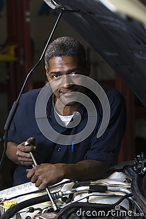 Automobile mechanic smiling Stock Photo