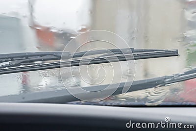 Automobile windshield wipers in the rain Stock Photo