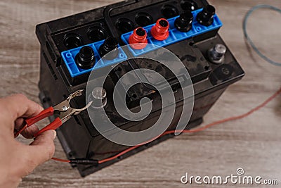 Automotive battery maintenance Stock Photo