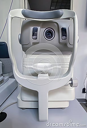 An autorefractor or automated refractor a computer-controlled machine used during an eye examination Stock Photo