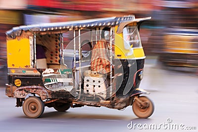 Autorickshaw in the street of Sadar Market, blurred motion, Jodhpur, India Editorial Stock Photo