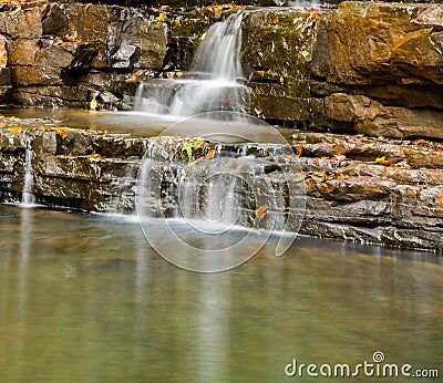 Autuman View of a Staircase Cascading Waterfall Stock Photo