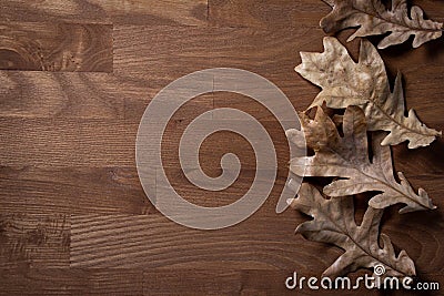 Autumn background for an inscription. Autumn leaves on a wooden surface Stock Photo