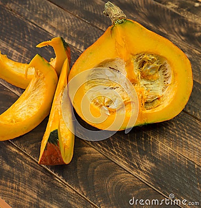 Autumn background with pumpkin on wooden board Editorial Stock Photo