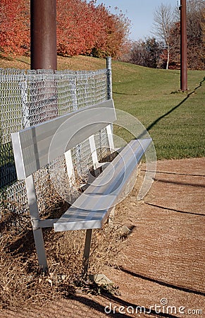 Autumn Baseball field Bench Stock Photo