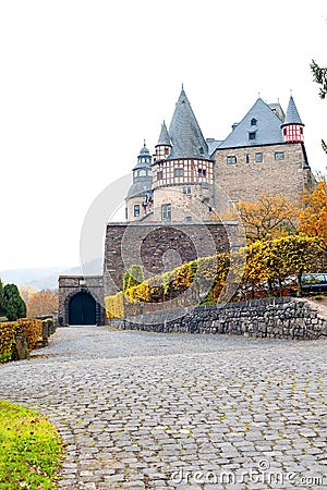 Autumn Burresheim Castle with royal ornamental garden Stock Photo