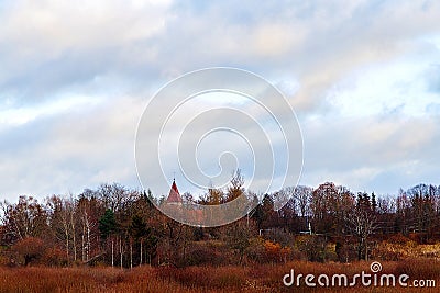 In the autumn the church tower Stock Photo