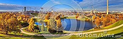 Autumn cityscape, panorama, banner - view of the Olympiapark or Olympic Park and Olympic Lake in Munich Editorial Stock Photo