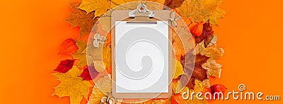 Autumn clipboard mockup with fall leaves Stock Photo