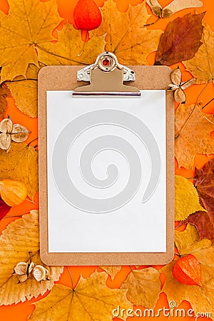 Autumn clipboard mockup with fall leaves Stock Photo