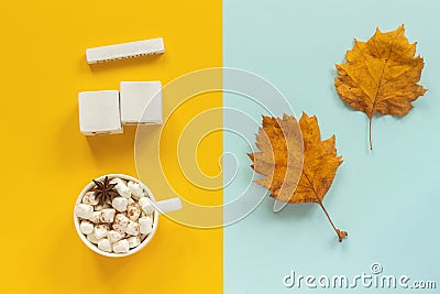 Autumn composition. Blank wooden white cubes mockup for your calendar data, cup of cocoa with marshmallows and yellow autumn Stock Photo