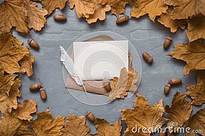 Autumn composition. Craft envelope. card mockup with autumn marple leaves. Flat lay, top view, copy space Stock Photo