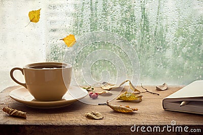 Autumn. Cup of tea and note book. Stock Photo