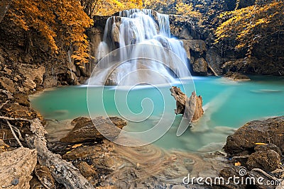 Autumn Deep forest Waterfall in Kanchanaburi (Huay Mae Kamin) Stock Photo