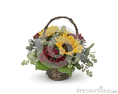 Autumn Fall Flower Arrangement with Sunflowers in a Basket - Thanksgiving Centerpiece Stock Photo