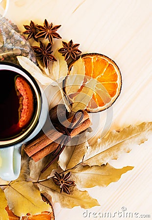 Autumn, fall leaves, hot steaming cup of glint wine Stock Photo