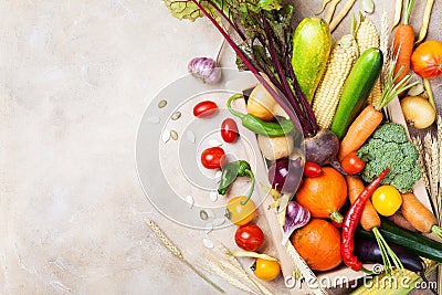 Autumn farm vegetables and root crops on wooden box top view. Healthy and organic food. Stock Photo