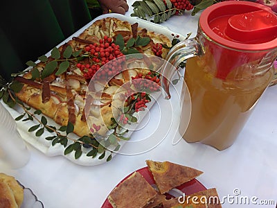 Homemade cakes with apples and a decanter with Apple juice. Stock Photo