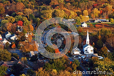 Autumn foliage surrounds a quaint New England town Stock Photo