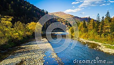 Autumn forest and sky and mountains and river Stock Photo