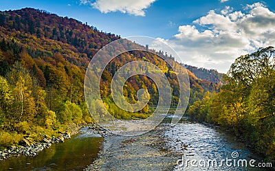 Autumn forest and sky and mountains and river Stock Photo