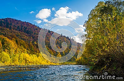 Autumn forest and sky and mountains and river Stock Photo