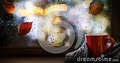 autumn frame border cup of hot autumn coffee or tea on the window. Living in Hygge style. Hot drink in cold autumn weather Stock Photo