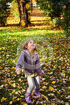 Autumn fun, happy child Stock Photo