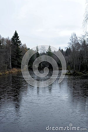 Lake covered with first thin ice Stock Photo